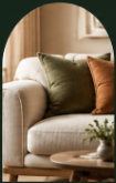 Bespoke linen sofa with olive and rust pillows